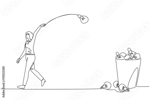 Single one line drawing businesswoman walking throwing lightbulb into trash can. Throwing away the opportunity to have the best innovation for the company. Continuous line design graphic illustration