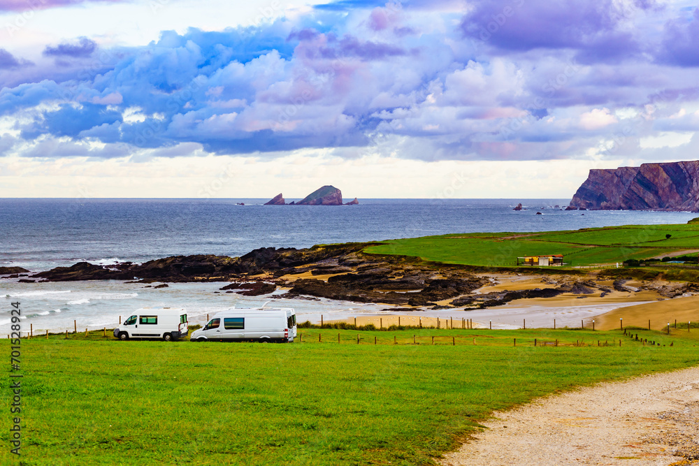 Naklejka premium Campervans on sea coast in Asturias Spain.