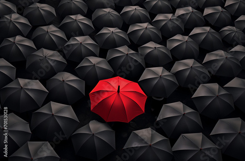 One red umbrella among a crowd of black ones. Creative embracing diversity minimal concept.Flat lay,top view,copy space.Generative AI
