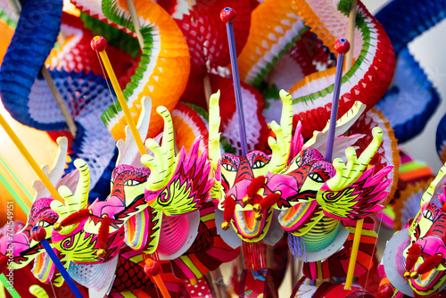 Colorful Chinese dragon toys in Chinese New Year festival.Chinese New Year Decoration, Dragon toy paper on festive background.