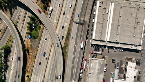 Top down drone shot of cars driving on the freeway through Seattle's Industrial District. photo