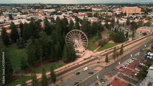 drone shot around Fremantle ferris wheel in Perth suburbs in Western Australia with the harbour in the background photo