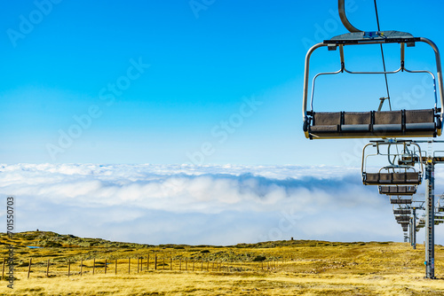 Chair lift in mountain, Serra da Estrela, Portugal photo