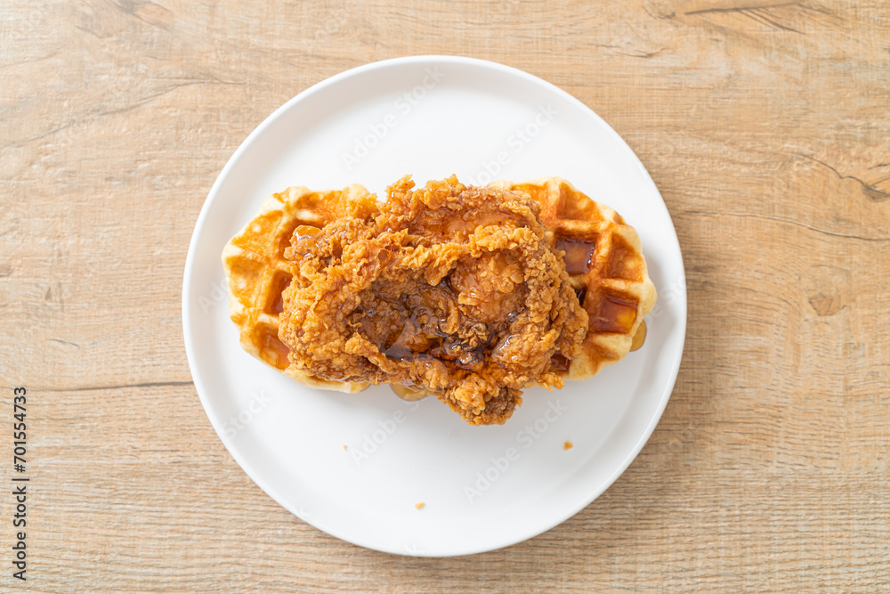 fried chicken waffle with honey or maple syrup fried chicken waffle with honey or maple syrup