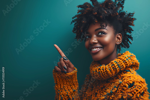 Black african woman in bright orange sweater