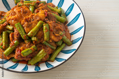 Stir fried pork with red curry paste