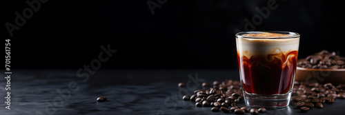 Smooth Velvet Cherry Espresso in Elegant Glass Cup Against a Single tone Slate Backdrop with Space for Text