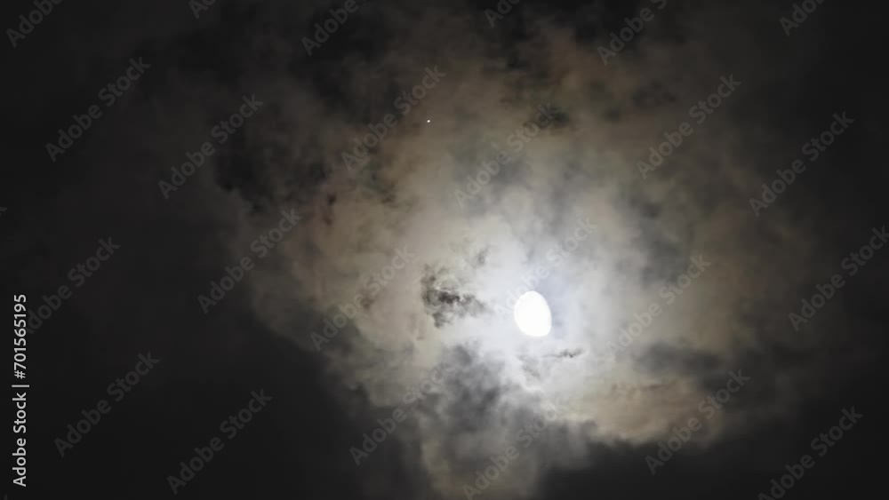 Clouds passing by moon at night. Full moon at night with cloud real time. mystery fairyland scene. Clouds passing by moon at night. Full moon at night with cloud real time. mystery fairyland scene.