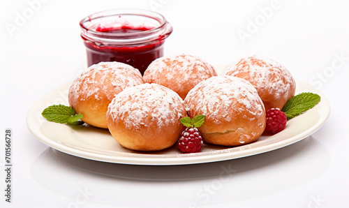 raspberry bomboloni. doughnut with Raspberry Jam on white plate isolated on white background photo