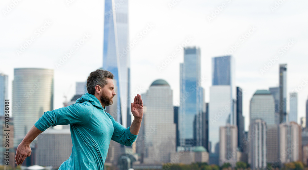 Sport runner. Man running. Fit male sport fitness model sprinting outdoors. Attractive man running fast, workout outdoors, runner jogging over street in NYC. Fitness, health man running on street. Sport runner. Man running. Fit male sport fitness model sprinting outdoors. Attractive man running fast, workout outdoors, runner jogging over street in NYC. Fitness, health man running on street.