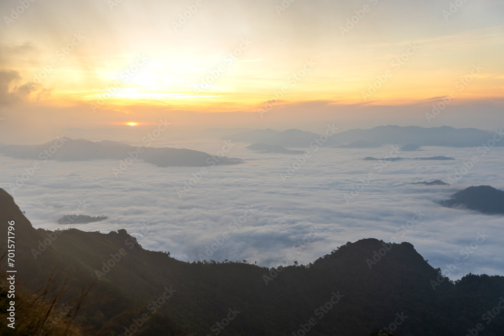Top view Landscape of Morning Mist with Mountain Layer at north of Thailand. mountain ridge and clouds in rural jungle bush forest Top view Landscape of Morning Mist with Mountain Layer at north of Thailand. mountain ridge and clouds in rural jungle bush forest