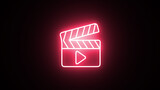 Neon glowing Clapperboard icon. neon Open and closed movie clapper. Film clapper board icon. Clapperboard sign. Glowing neon Movie clapper icon isolated on black background.