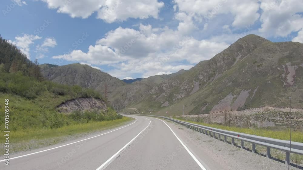 Video of driving in a car In summer season along the mountain road in Altai. Video of driving in a car In summer season along the mountain road in Altai.