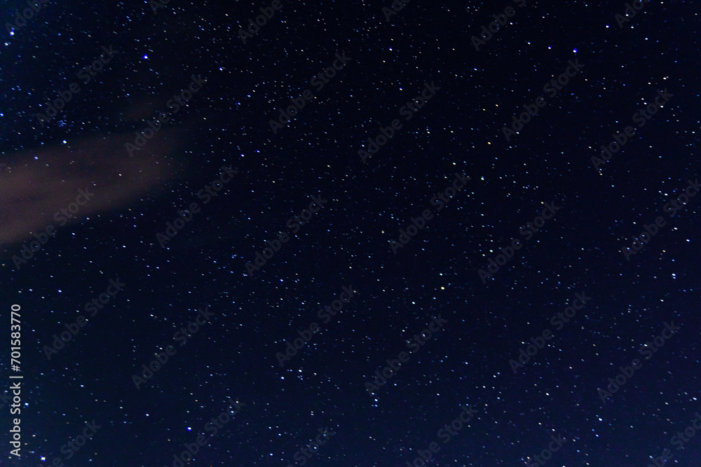 Obraz premium Background of the night sky with many stars