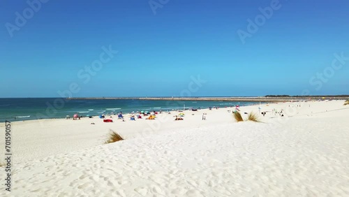 Praira da Barra amazing white sand beach in autumn from Gafanha da Nazaré, Portugal. photo