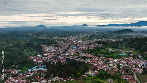 The city of Berestagi in the valley among the farmland. Sumatra, Indonesia. photo