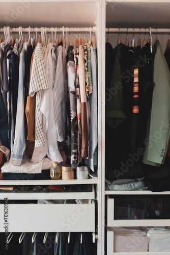Obraz na plátně A closet full of clothes and accessories is a treasure trove of possibilities