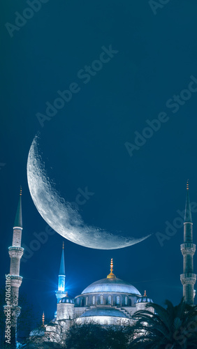 The Blue Mosque or Sultanahmet Camii with crescent moon. Ramadan concept image. photo
