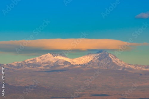 A saucer-shaped cloud over the two peaks of Mount Aragats, Armenia