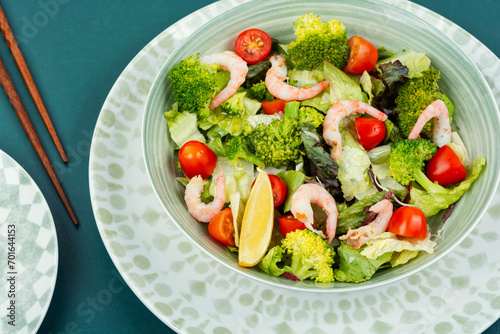 Salad with broccoli and shrimp, Asian food.