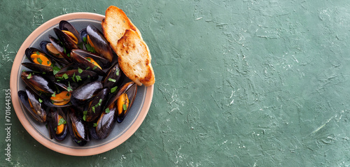 Cooked mussels with oil and parsley. Sea food. Healthy eating. Diet.