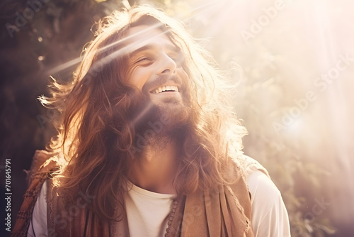Portrait of a handsome man Jesus with long wavy blond hair and beard