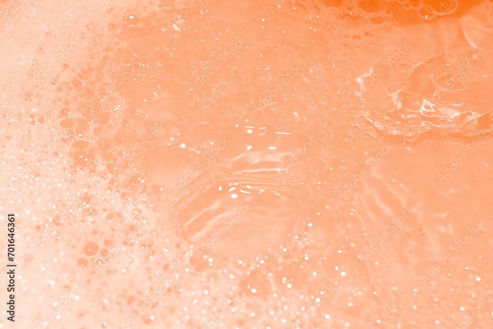 Soap bubbles wallpaper in transparent orange water. defocus not clear details Soap bubbles wallpaper in transparent orange water. defocus not clear details