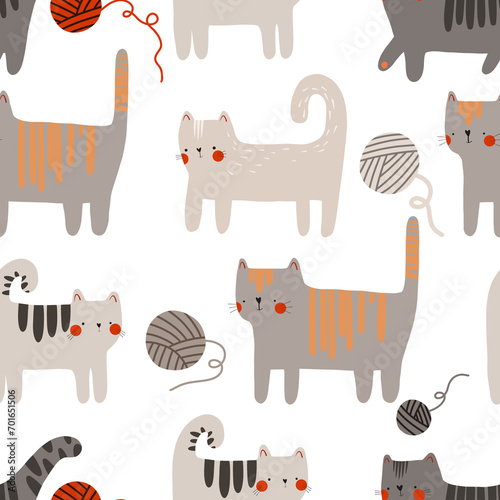seamless pattern with cartoon cats. Kittens play with balls of thread. Cute children's design