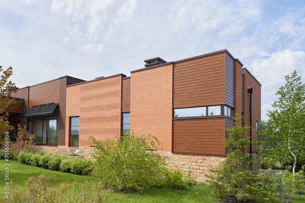 Wood and brick exterior of a modern house Wood and brick exterior of a modern house
