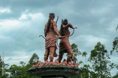 Surakarta, Indonesia (06/2022) Statue of two people
archer statue in the Manahan stadium area in Solo city,Indonesia. photo