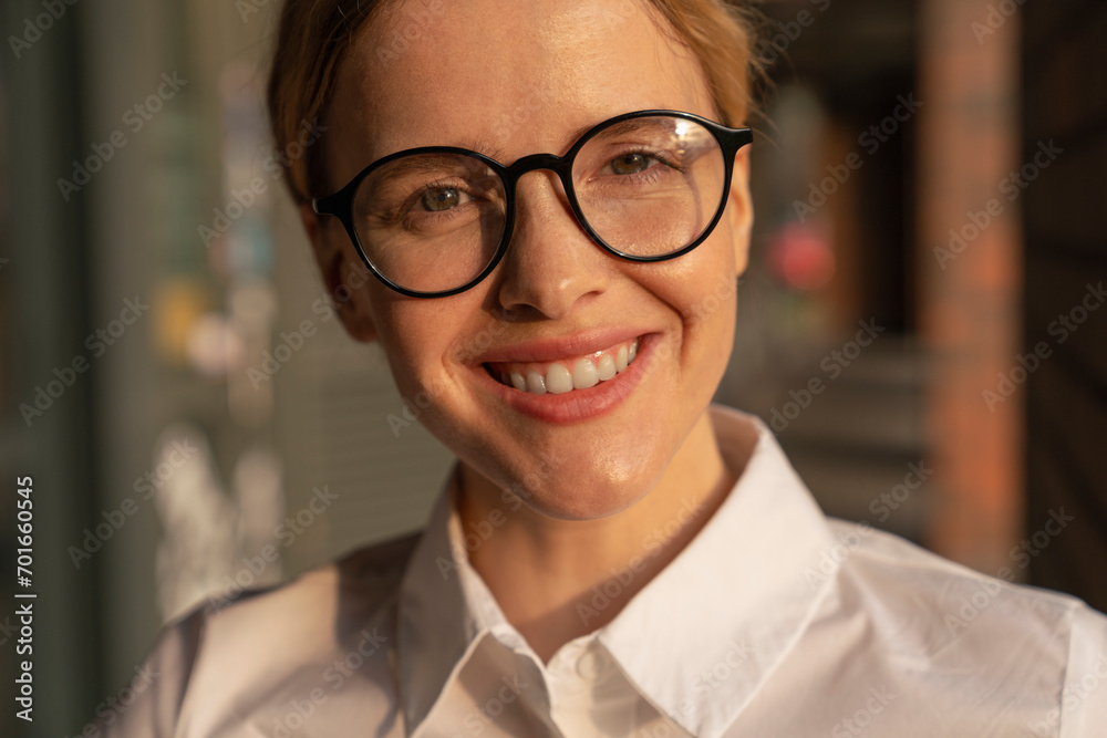 Smiling beautiful businesswoman wearing eyeglasses Smiling beautiful businesswoman wearing eyeglasses