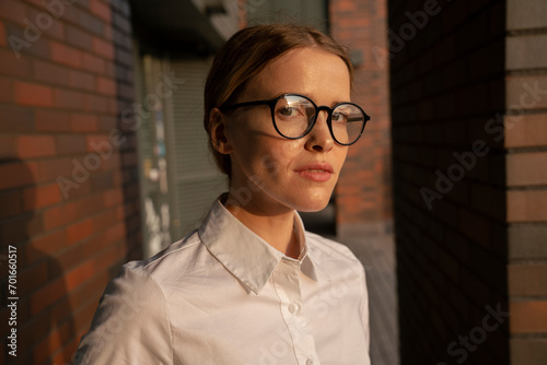 Businesswoman in formalwear wearing eyeglasses photo