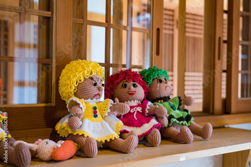 Wallpaper Mural Korean handmade yarn doll on a wooden frame, South Korea Torontodigital.ca