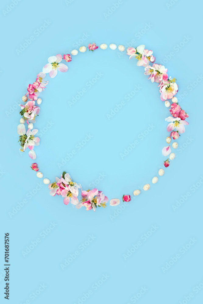 Obraz premium Easter egg and apple blossom flower wreath. Minimal abstract floral design with mini eggs for card, logo, gift tag or invitation on pastel blue.