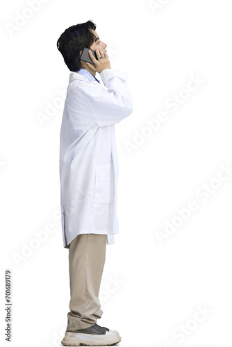 The guy is a doctor, on a white background, full-length, with a phone