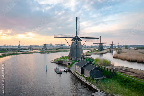 dutch windmill in the country at river at kinderdijk