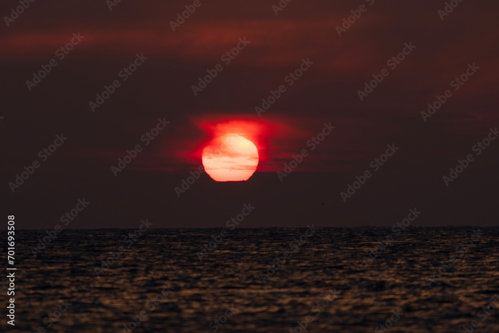 The cool sea breeze caressing your face and the first rays of the sun painting the sky in shades of pink, orange and gold. The cool sea breeze caressing your face and the first rays of the sun painting the sky in shades of pink, orange and gold.