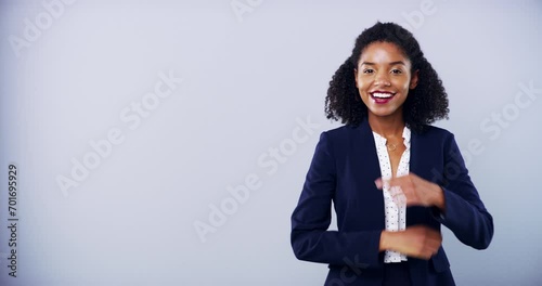 Happy, face and business woman with hand pointing in studio for contact us, info or feedback on grey background. We are hiring, recruitment or portrait of lady recruiter with offer, guide or sign up photo