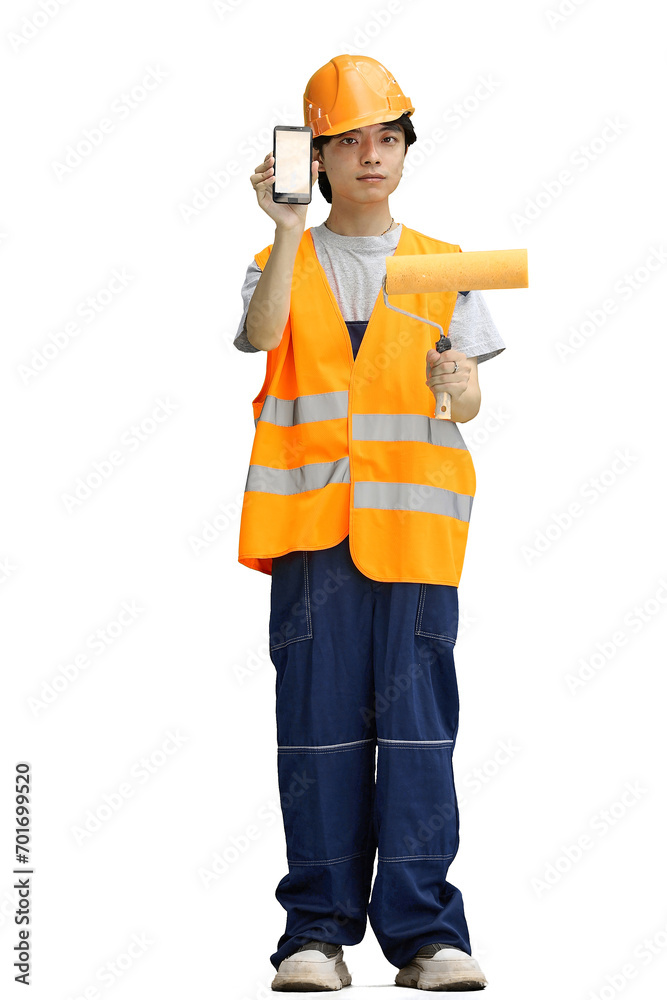 The guy is a builder, on a white background, full-length, with a roller and a phone The guy is a builder, on a white background, full-length, with a roller and a phone