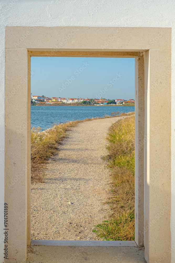 door to the street with dirt path in an idyllic setting promoting freedom
door to the street with dirt path in an idyllic setting promoting freedom