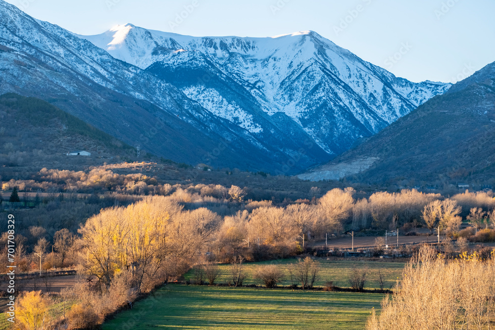Elevated view of landscape in autumn in the Pyrenees in the region of Cerdanya in the province of Gerona in Catalonia in Spain Elevated view of landscape in autumn in the Pyrenees in the region of Cerdanya in the province of Gerona in Catalonia in Spain