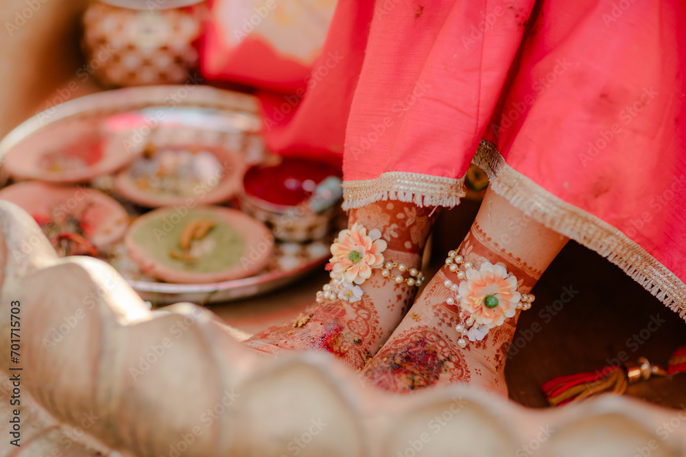 Traditional Haldi turmeric is kept on a flower plate for the Hindu marriage ceremony