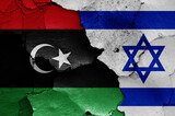 flags of Libya and Israel painted on cracked wall