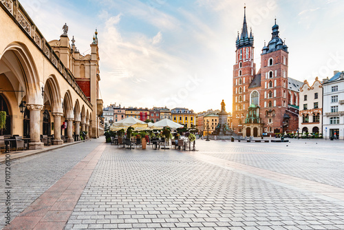 Cracow, Poland old town and St. Mary's Basilica seen from Cloth hall at sunrise photo
