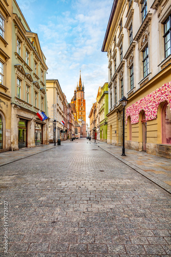 Old town street in Cracow  Poland with St. Mary s Basilica