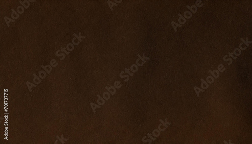 A rich, brown textured paper surface with rough patterns, perfect for elegant rustic or vintage designs © LADALIDI