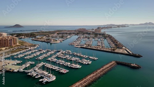 La Manga, Puerto Tomas Maestre, Murcia, Spain. Drone view of the boats. Mediterranean coast and Mar Menor on a sunny day with blue sky. photo