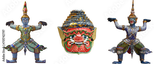 demon statue and demon mask with support golden pagoda isolated on white background photo