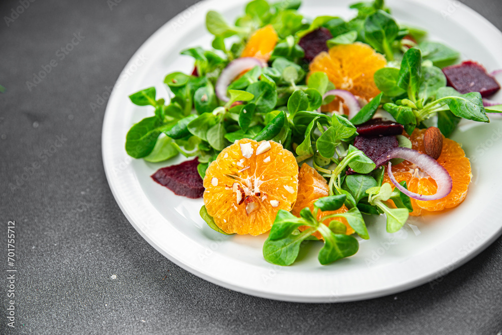 tangerine salad citrus, beets, green leaf lettuce, onion fresh delicious healthy eating meal food snack on the table copy space food tangerine salad citrus, beets, green leaf lettuce, onion fresh delicious healthy eating meal food snack on the table copy space food