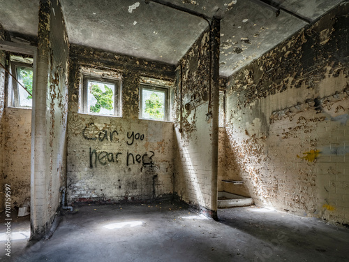 White tiled toilet block in old abandoned airbase